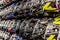 Motorcycle helmets displayed on a wall of a motorsports retailer