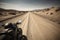 Motorcycle journey in desert. Generate ai