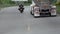Motorcycle Passes Fuel Truck