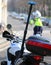 motorcycle police with flashing siren and a traffic officer