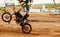 Motorcycle, power and motion blur with a sports man on space for dirt biking race or challenge. Bike, fitness and speed