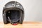 Motorcycle protective gear - helmet on a wooden background