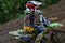 Motorcycle racers In rainy weather and a muddy track