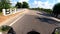 Motorcycle ridding on tarmac road with amazing blue sky and cloud patch