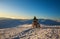 Motorcycle rider extreme sport biker on winter snowy mountains