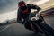 Motorcycle rider on the road. Motocross sport bike, A man wearing a helmet and riding a motorcycle, AI Generated