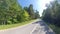 Motorcycle on a road. Dynamic panorama of the motorcycle moving along the road