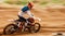 Motorcycle, sand and motion blur with a sports man on space in the desert for dirt biking. Bike, fitness and speed with