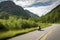 motorcycle speeding past scenic mountain range