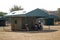 Motorcycle at a tent in a campground in Pilanesberg National Park