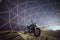 Motorcycle under stars of Milky Way Galaxy