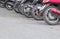 Motorcycle wheel dirty parked in public park on the road with copy space add text