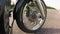 Motorcycle wheel goes forward. Close up