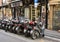 Motorcycles parked on a main shopping street in Sorrento, Italy