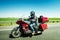 Motorcyclist driving Honda Goldwing GL100 fast on highway