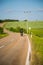 Motorcyclist on highway, blue sky