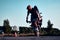 Motorcyclist making doing a difficult and dangerous stunt on his motorbike