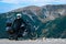 Motorcyclist man and Adventure Motorbike on the top of the mountain. Motorcycle trip. World Traveling, Lifestyle Travel vacations