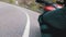 Motorcyclist Rides along on the Scenic Mountain Curve Road. Side view. POV.