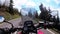 Motorcyclist Rides on a Beautiful Landscape Mountain Road in Slovakia. Serpentine Road