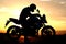 Motorcyclist silhouette at the sunset