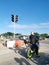 Motorcyclist at the traffic light junction waiting turn to go in the morning