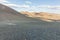 A motorcyclist tries his motorcycle in the mountains of Mongolia