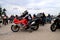 Motorcyclists on Cool Motorbikes, in helmets and leather jackets, open the motorcycle season, Motorcycling in Motorcycle Racing