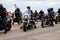 Motorcyclists on Cool Motorbikes, in helmets and leather jackets, open the motorcycle season, Motorcycling in Motorcycle Racing