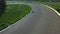 Motorcyclists ride on racing track. Aerial view moto race on racing track