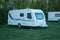 Motorhome campers parked in a  camp in early spring