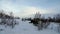 Motorhome at frozen lake Tornetrask in Abisko National Park in Sweden in winter