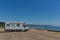 Motorhome parked in car park by the beach Slapton Sands England UK