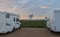 Motorhome parking in the middle of nature at dawn. Mobile house in Castilla la Mancha with windmills