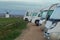 Motorhome parking in the middle of nature at dawn. Mobile house in Castilla la Mancha with windmills