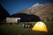 Motorhome, sidecar motorcycle and tent, camping in the mountains