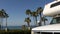 Motorhome trailer or caravan for road trip. Ocean beach, California USA. Camper van, RV motor home.