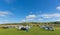 Motorhomes and campervans parked on a camping site