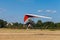 The motorized hang glider over the ground