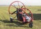 Motorized paraglider on airfield