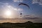 Motorized paraglider in the sky.