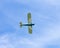 Motorsport airplane on the blue sky