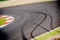 Motorsport racing track and car slammed brakes sign