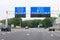 Motorway A1 with traffic and route signs, Amsterdam, Netherlands