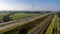 Motorway with few cars and railroad next to it, near the exit of Brecht in Belgium, Europe.