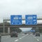 motorway junction with large signs indicating the border towns i