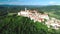 Motovun. Aerial view of idyllic hill town of Motovun surrounded by defense stone walls and Mirna river valley.