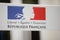 Motto of the French Republic on a cardboard sign