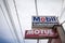 Motul and Mobil Lubricants and Oil logo on a retailer in Serbia. Motul and Mobil are brands of motor oil and lubricants