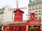 Moulin rouge, buildings and architecture typical of paris